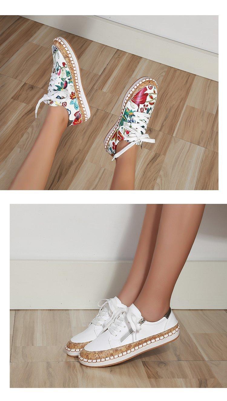 Women's colorful flower print lace-up sneakers pair with white sole and cork trim midsole on Tampa Home & Garden Store
White lace-up casual sneakers with cork-trim sole for a sporty walking style on Tampa Home & Garden Store