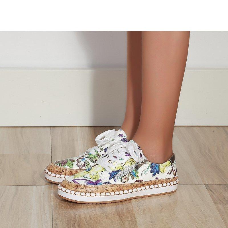 Stevvex women's sneakers with white base and floral print, lace-up espadrille rope sole on Tampa Home & Garden Store