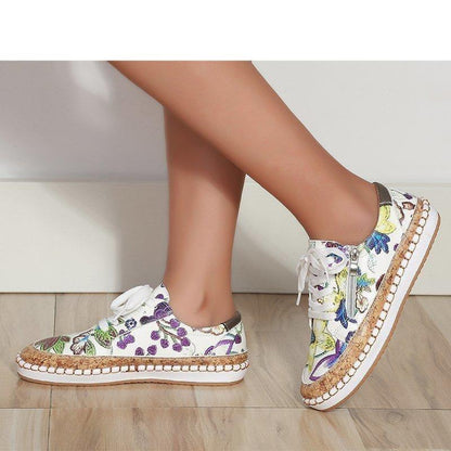 Women’s Stevvex floral print lace-up sneakers with white sole and woven midsole on Tampa Home & Garden Store