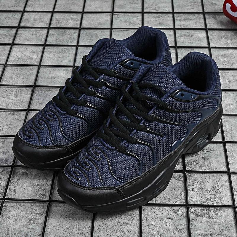 Stevvex ST85SH3720SKY navy running sneakers with cushioned sole, black outsole, pair on Tampa Home & Garden Store