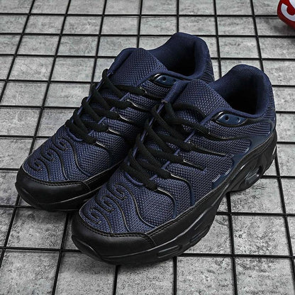 Stevvex ST85SH3720SKY navy running sneakers with cushioned sole, black outsole, pair on Tampa Home & Garden Store