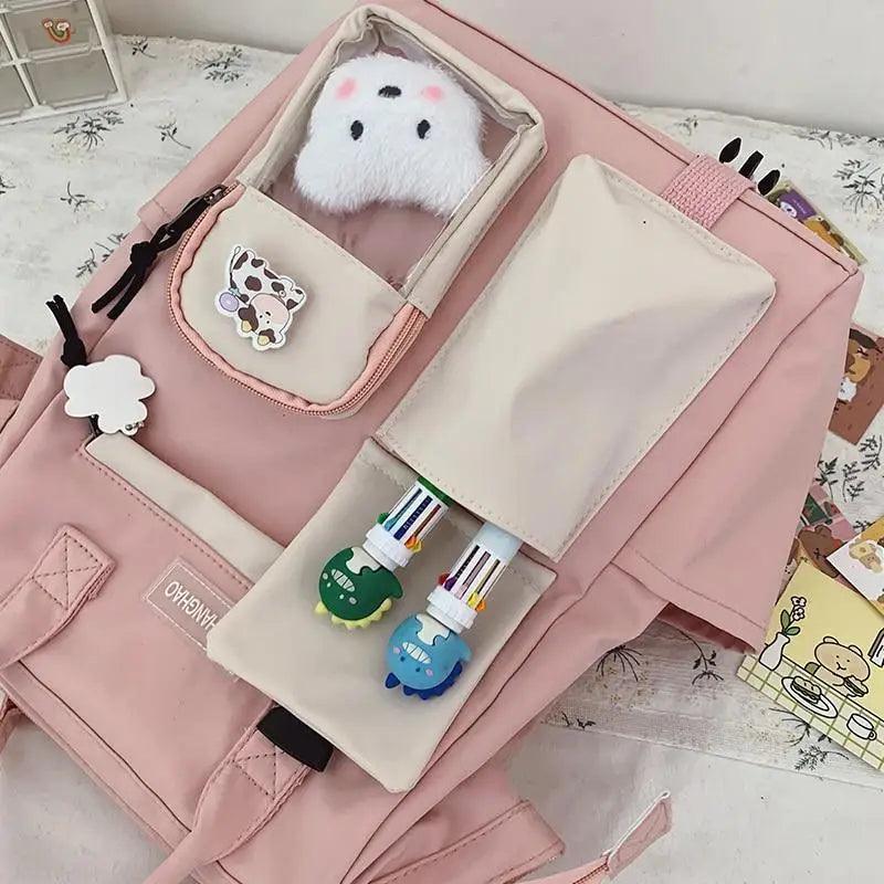 Stevvex ALU92987KLM pink candy colors school backpack with beige pockets and plush keychain on Tampa Home & Garden Store