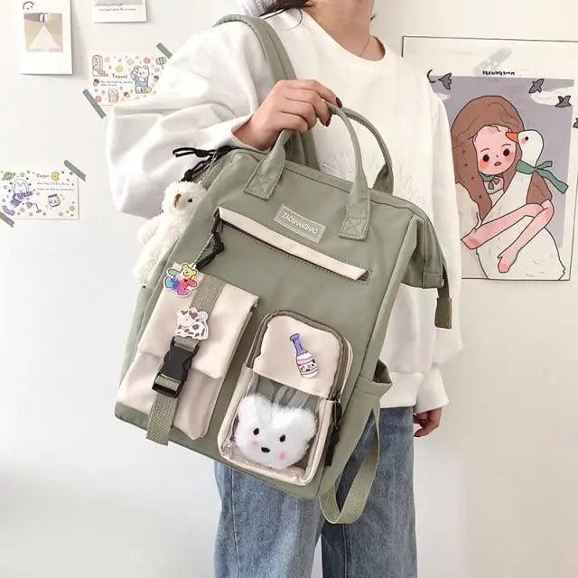 Stevvex ALU92987KLM school backpack sage green with front zip pockets and clear vinyl pocket on Tampa Home & Garden Store