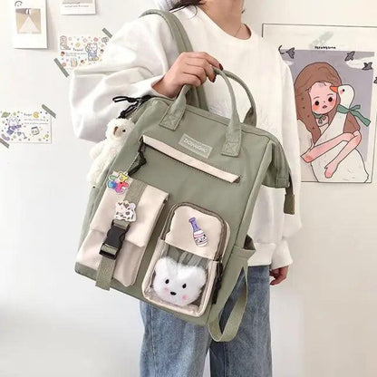 Stevvex ALU92987KLM school backpack sage green with front zip pockets and clear vinyl pocket on Tampa Home & Garden Store