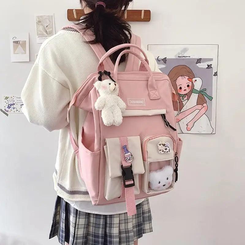 Stevvex pink candy-color school backpack with plush keychain and front pockets on Tampa Home & Garden Store