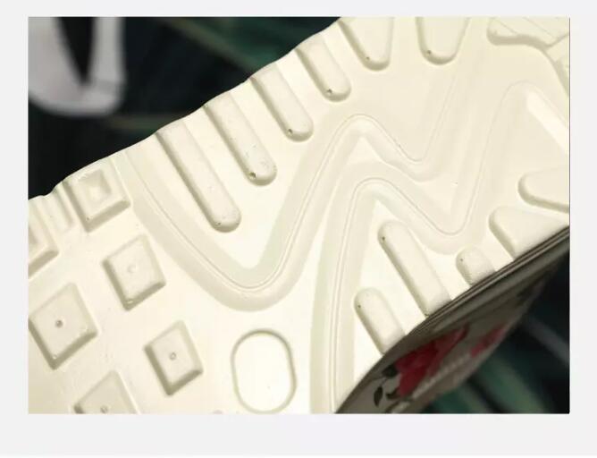 Platform sneakers sole close-up in white featuring geometric tread on Tampa Home & Garden Store
