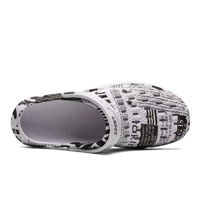 Stevvex newspaper-print slip-on sandals with hollow-out design and anti-skid sole on Tampa Home & Garden Store