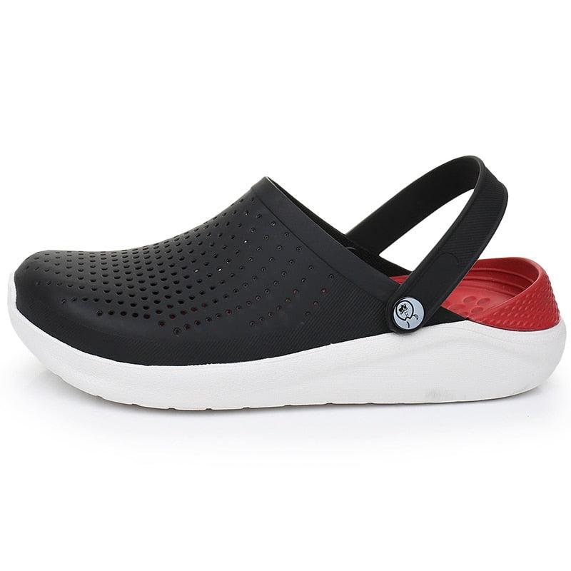 Stevvex unisex black perforated sandals with white sole and red accent on Tampa Home & Garden Store