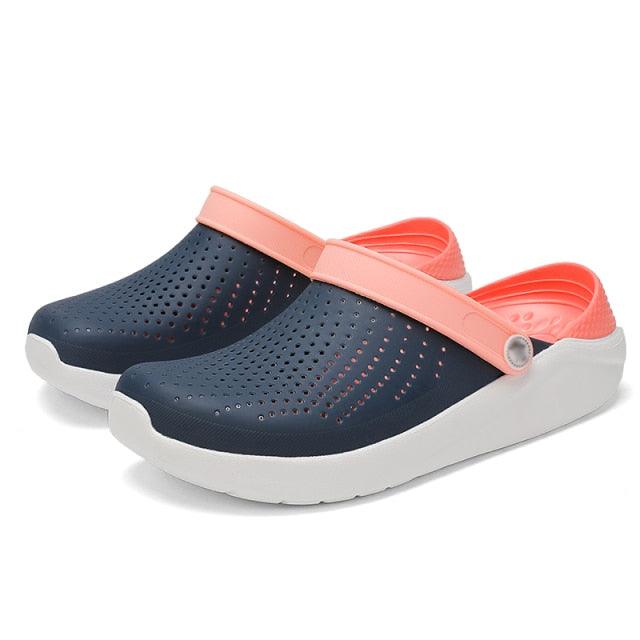 Stevvex water sandals unisex slip-on clogs with navy perforated upper and pink strap, white sole on Tampa Home & Garden Store