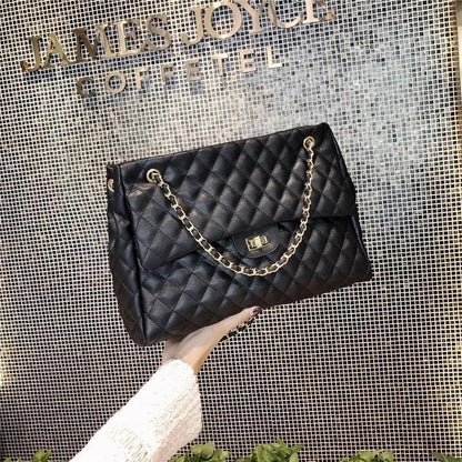 Women PU leather shoulder bag Stevvex black quilted with gold chain strap large capacity on Tampa Home & Garden Store