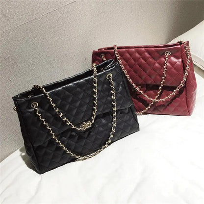 Stevvex quilted PU leather shoulder bags in black and burgundy with gold chain straps, two bags on Tampa Home & Garden Store