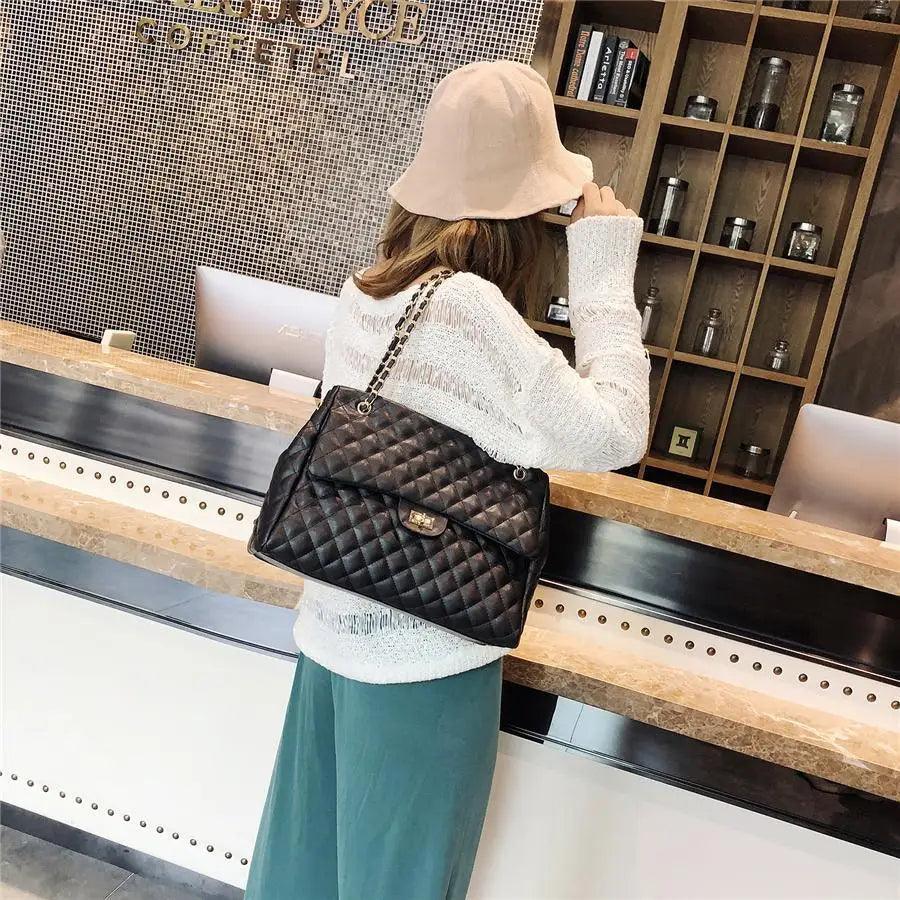 Women PU Leather shoulder bag, quilted black with clasp and chain strap, large capacity on Tampa Home & Garden Store