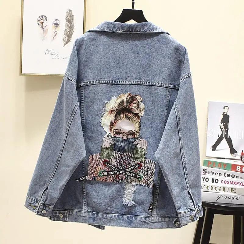 Stevvex denim trucker jacket with back graphic of a woman in knitwear and patchwork art on Tampa Home & Garden Store