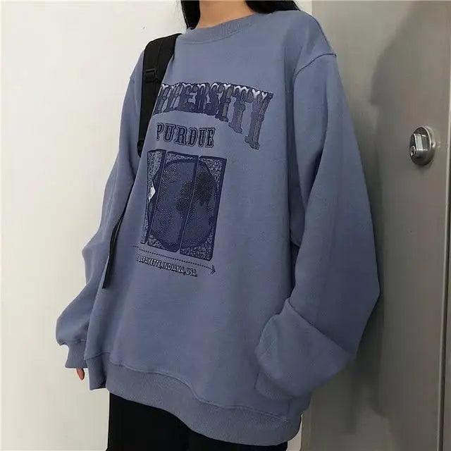 Stevvex oversized blue crew-neck sweatshirt with Purdue print and retro lettering on Tampa Home & Garden Store