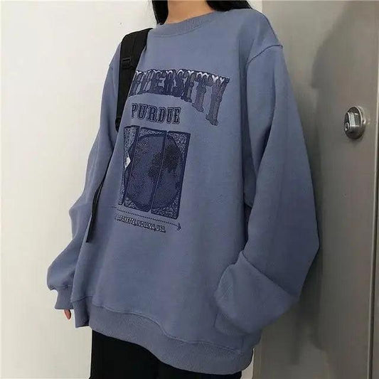 Stevvex oversized blue crew-neck sweatshirt with Purdue print and retro lettering on Tampa Home & Garden Store