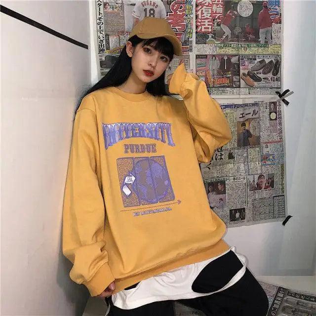 Stevvex oversized yellow crew-neck sweatshirt for women with retro purple letter print on Tampa Home & Garden Store