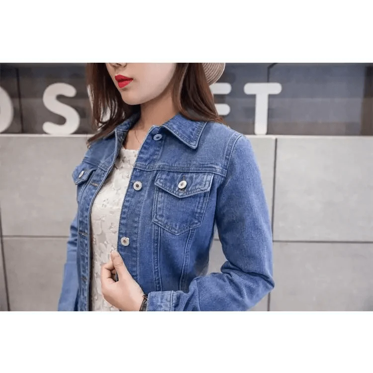Women’s blue denim trucker jacket with front pockets and silver buttons, long sleeves on Tampa Home & Garden Store