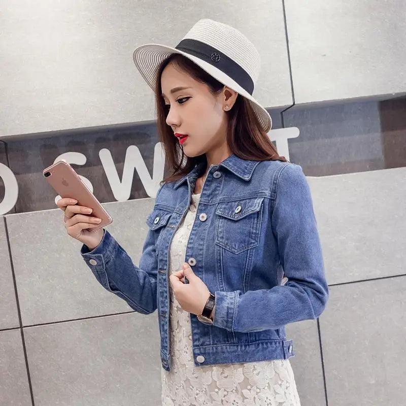 Denim trucker jacket by Stevvex with button front and chest pockets over lace dress on Tampa Home & Garden Store