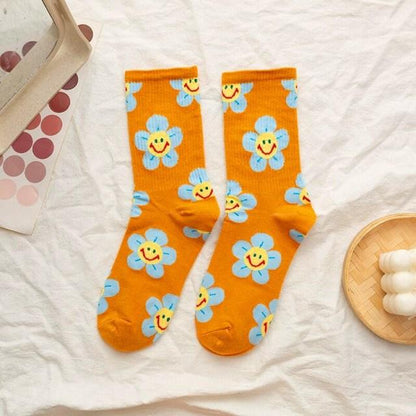 Stevvex orange crew socks pair with blue flower faces, breathable kawaii socks on Tampa Home & Garden Store