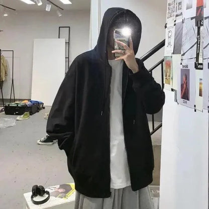 Stevvex black oversized fleece hoodie with hood over white tee in studio for men on Tampa Home & Garden Store