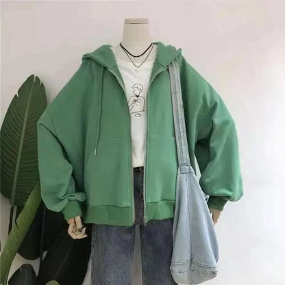 Stevvex green oversized hooded sweatshirt with white tee and denim tote bag on mannequin on Tampa Home & Garden Store