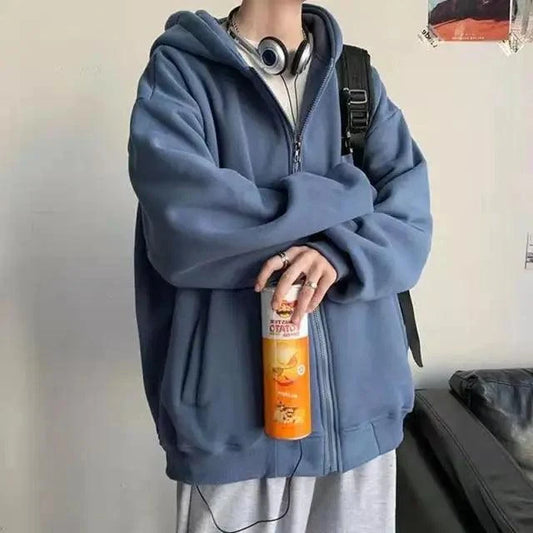 Stevvex blue fleece hooded sweatshirt worn by person with backpack, holding orange bottle on Tampa Home & Garden Store
