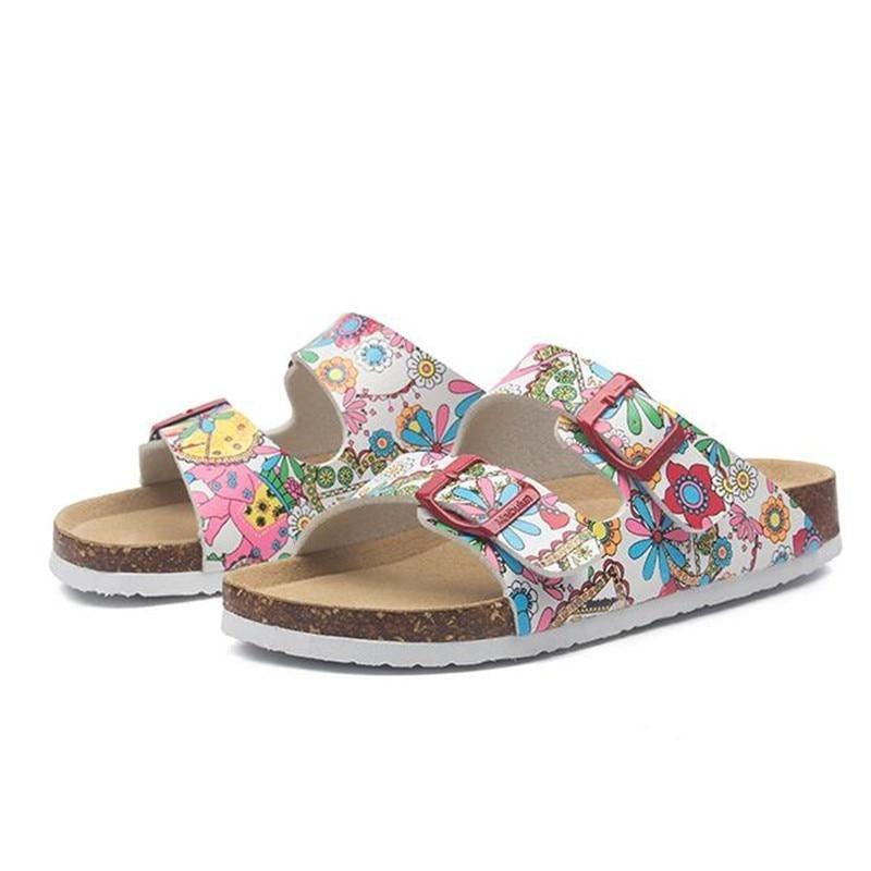 Stevvex women's floral double-buckle slide sandals pair with cork footbed and EVA sole on Tampa Home & Garden Store