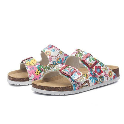 Stevvex women's floral double-buckle slide sandals pair with cork footbed and EVA sole on Tampa Home & Garden Store