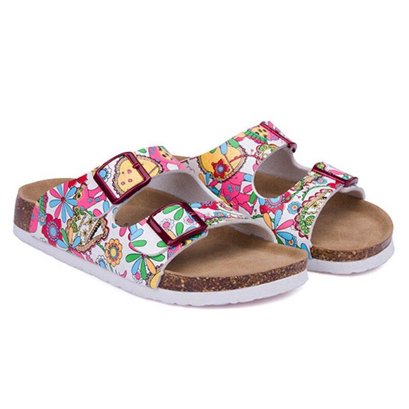 Women's floral double-buckle slides with cork footbed and white sole on Tampa Home & Garden Store