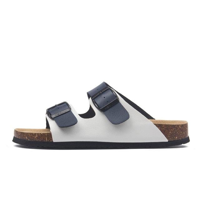 Stevvex women's double-buckle EVA slides with cork footbed, white upper and navy buckles on Tampa Home & Garden Store