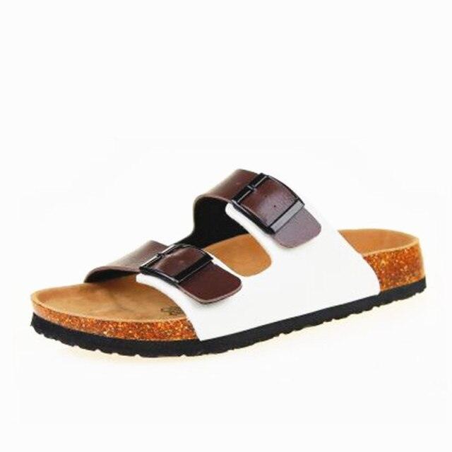 Stevvex white two-buckle slide sandal with cork footbed and black outsole on Tampa Home & Garden Store