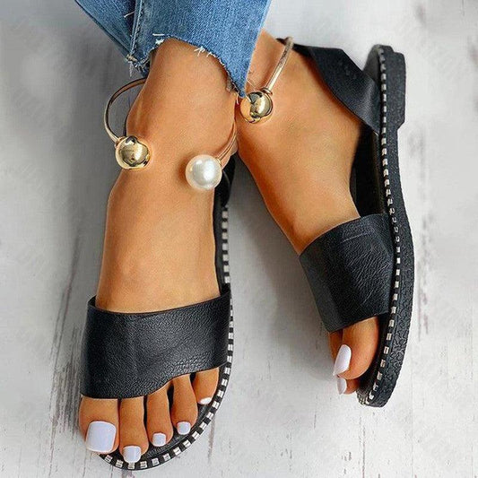 Stevvex black leather sandals pair with pearl anklet straps and stitched-edge sole on Tampa Home & Garden Store