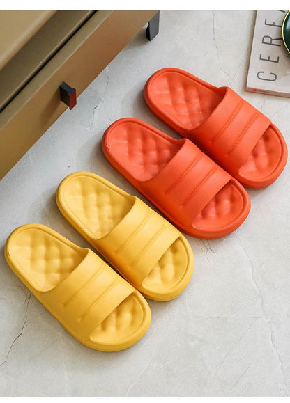 Stevvex EVA cloud slides in yellow, orange and red with quilted footbed on Tampa Home & Garden Store