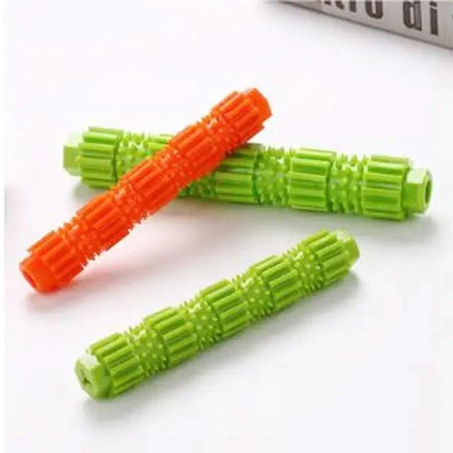 Stevvex dog chew toy rubber treat-dispensing squeaky teeth-cleaning sticks in green and orange on Tampa Home & Garden Store