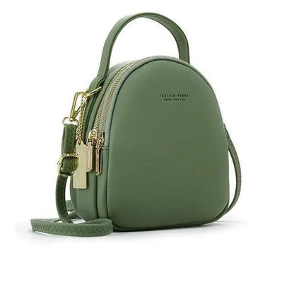 Stevvex green soft leather mini backpack with top handle and adjustable crossbody strap on Tampa Home & Garden Store
