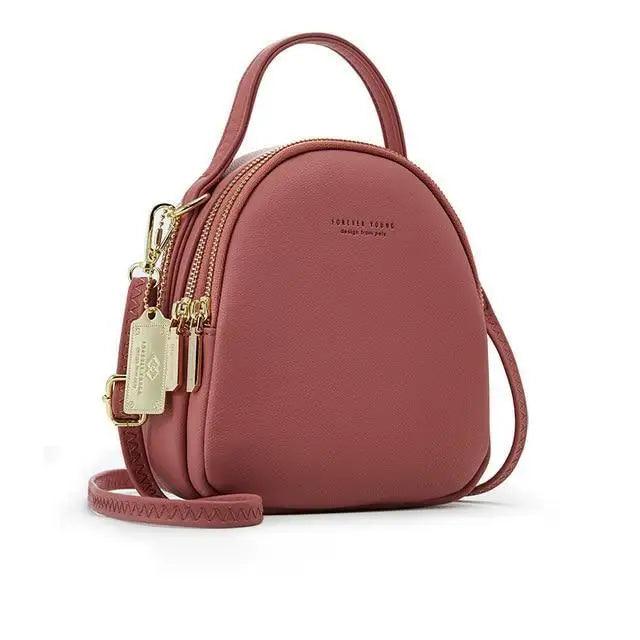 3-layer pink soft-leather backpack Stevvex with top handle and gold zippers on Tampa Home & Garden Store