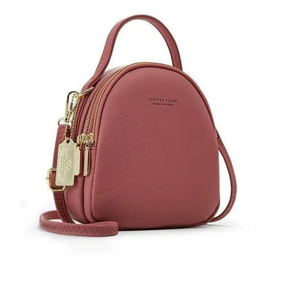 3-layer pink soft-leather backpack Stevvex with top handle and gold zippers on Tampa Home & Garden Store