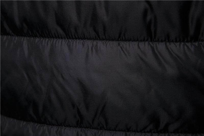 Stevvex men's quilted waterproof winter jacket close-up black hooded puffer fabric on Tampa Home & Garden Store