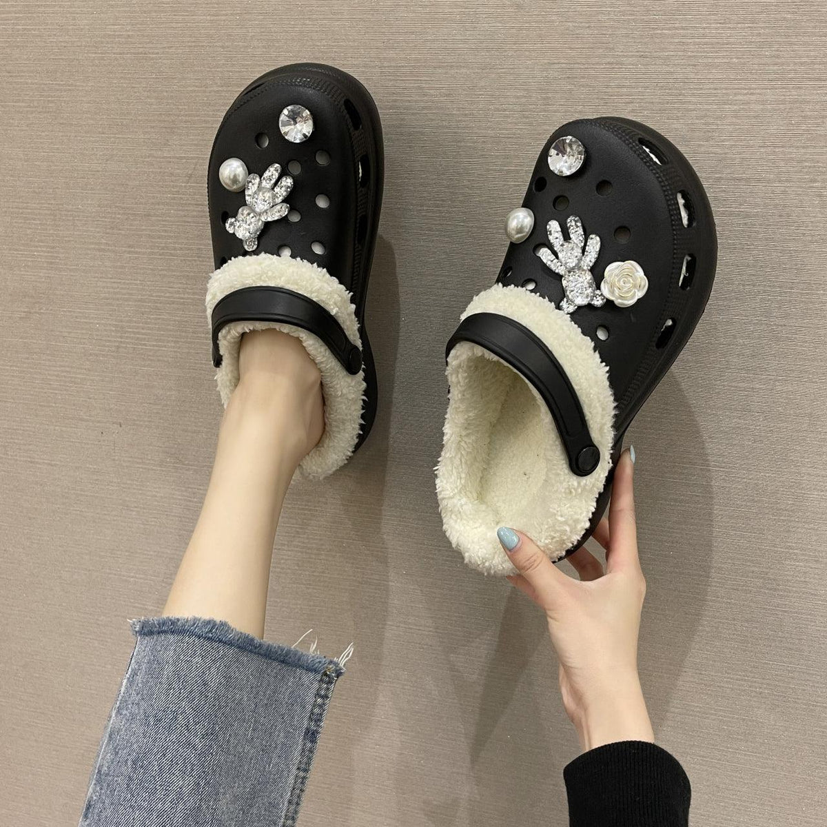 Stevvex black fuzzy-lined slippers pair with crystal accents and strap indoor clogs on Tampa Home & Garden Store