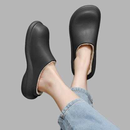 Stevvex women's black plush memory foam slippers with fur lining and thick 6cm sole on Tampa Home & Garden Store