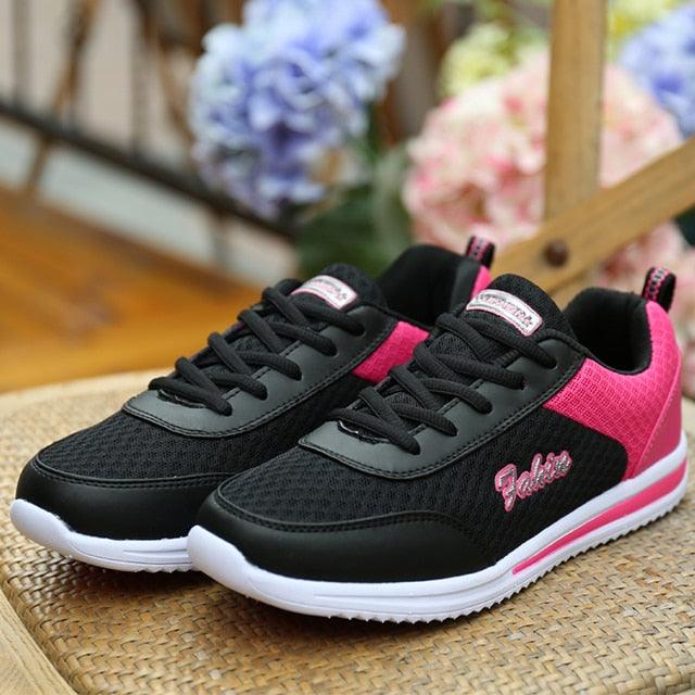 Stevvex women's black mesh sneakers with pink heel panel and white sole on Tampa Home & Garden Store