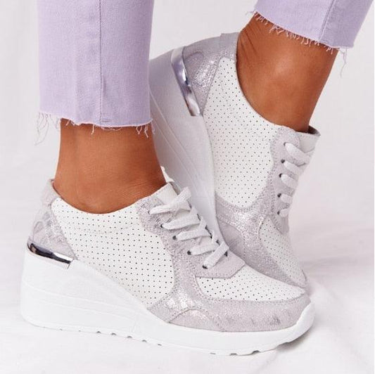Stevvex women's platform sneakers pair with white perforated upper and silver details on Tampa Home & Garden Store