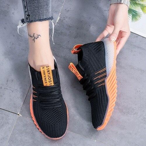 Women platform mesh sneakers Stevvex, black with orange sole and pull tabs on Tampa Home & Garden Store