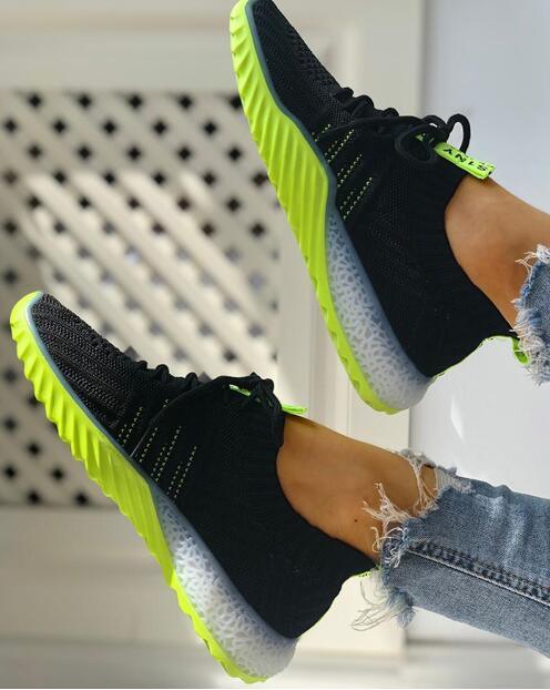 Women platform sneakers pair by Stevvex with black knit upper and neon lime outsole on Tampa Home & Garden Store