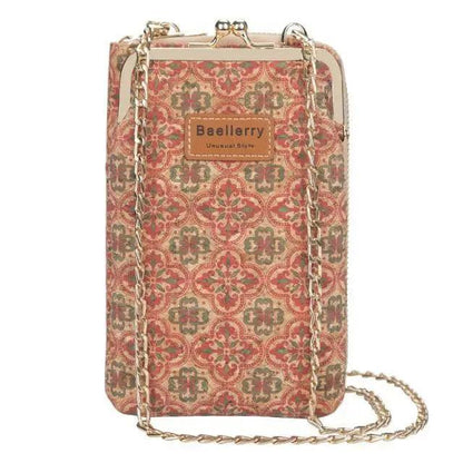 Crossbody Pu leather handbag with pink patterned fabric, gold chain strap, Baellerry label on Tampa Home & Garden Store