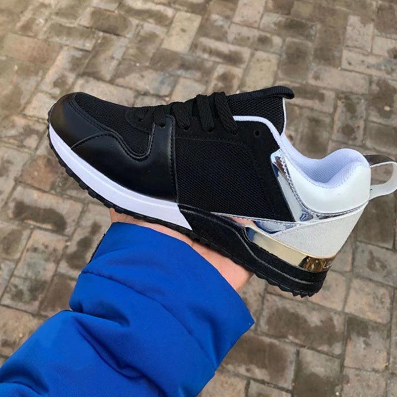 Stevvex women's sneakers with breathable black mesh upper and chrome heel accents on Tampa Home & Garden Store