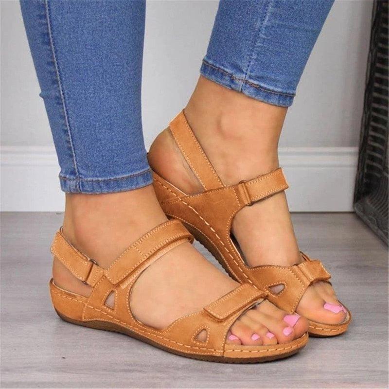Women's pair of tan open-toe flat sandals with back ankle strap and multiple straps Stevvex on Tampa Home & Garden Store