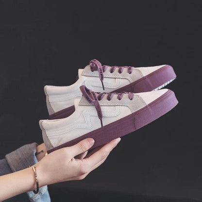 Stevvex white canvas sneakers pair with purple platform sole and purple laces on Tampa Home & Garden Store