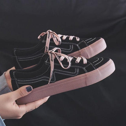 Stevvex women's black canvas sneakers pair with pink platform soles and pale pink laces on Tampa Home & Garden Store