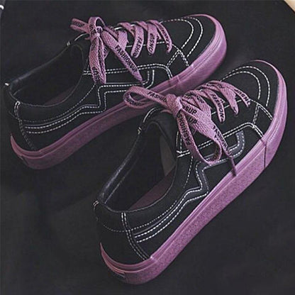 Stevvex women sneakers pair black canvas with purple sole and laces on Tampa Home & Garden Store